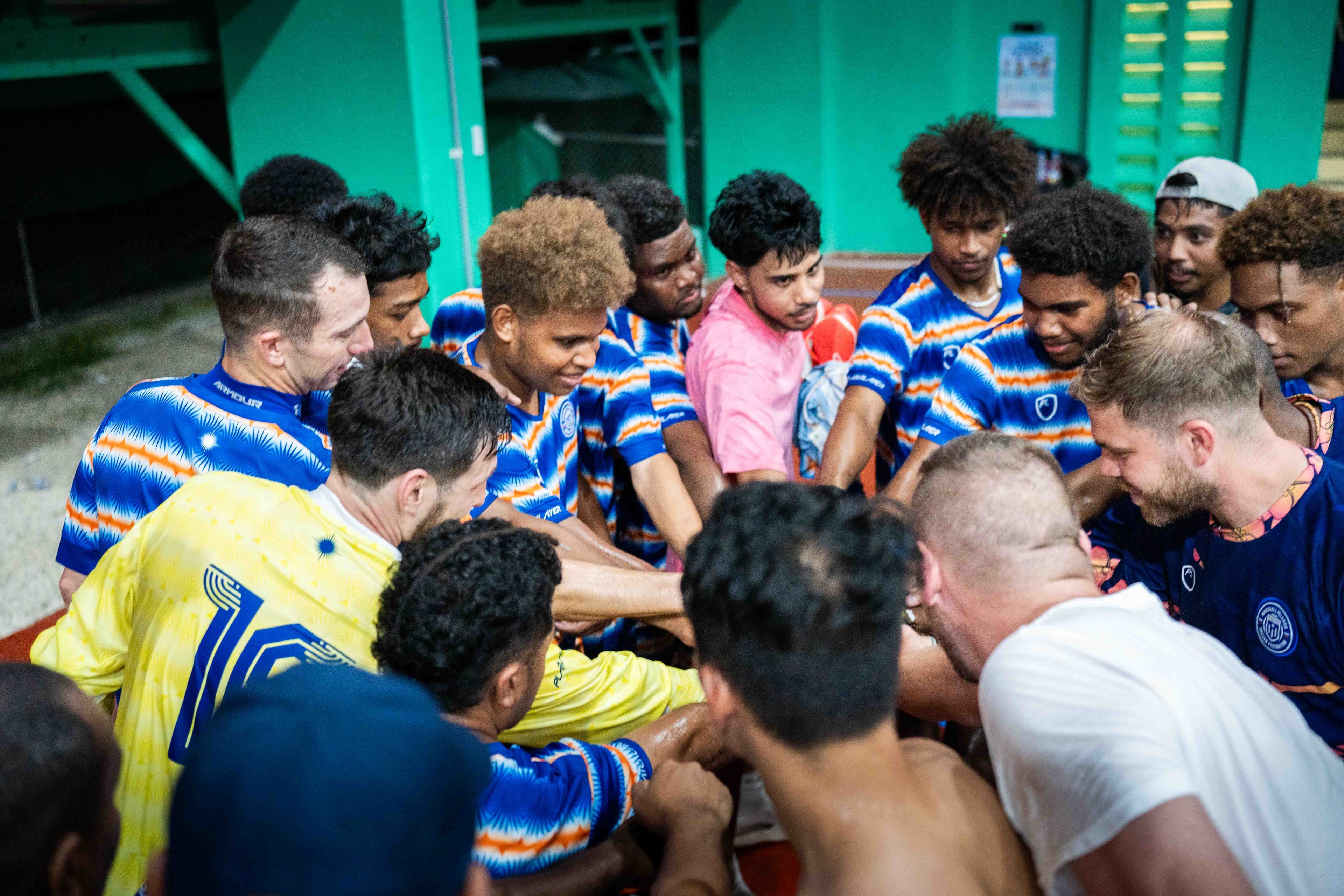 Marshall Islands team huddle